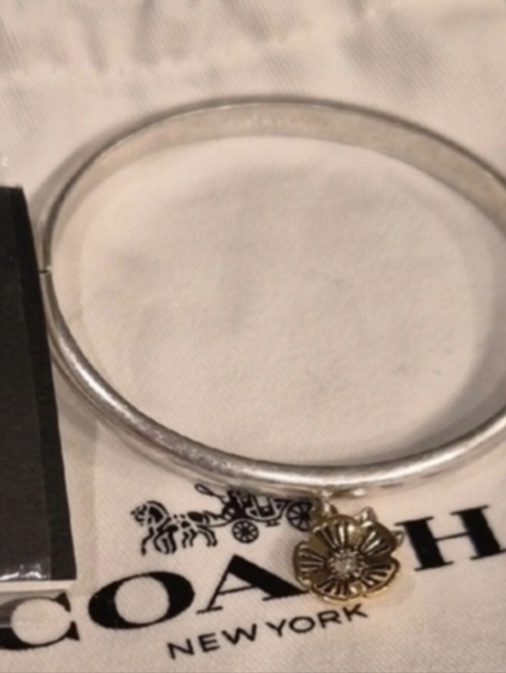 Coach Silver Bangle with Gold Flower Charm